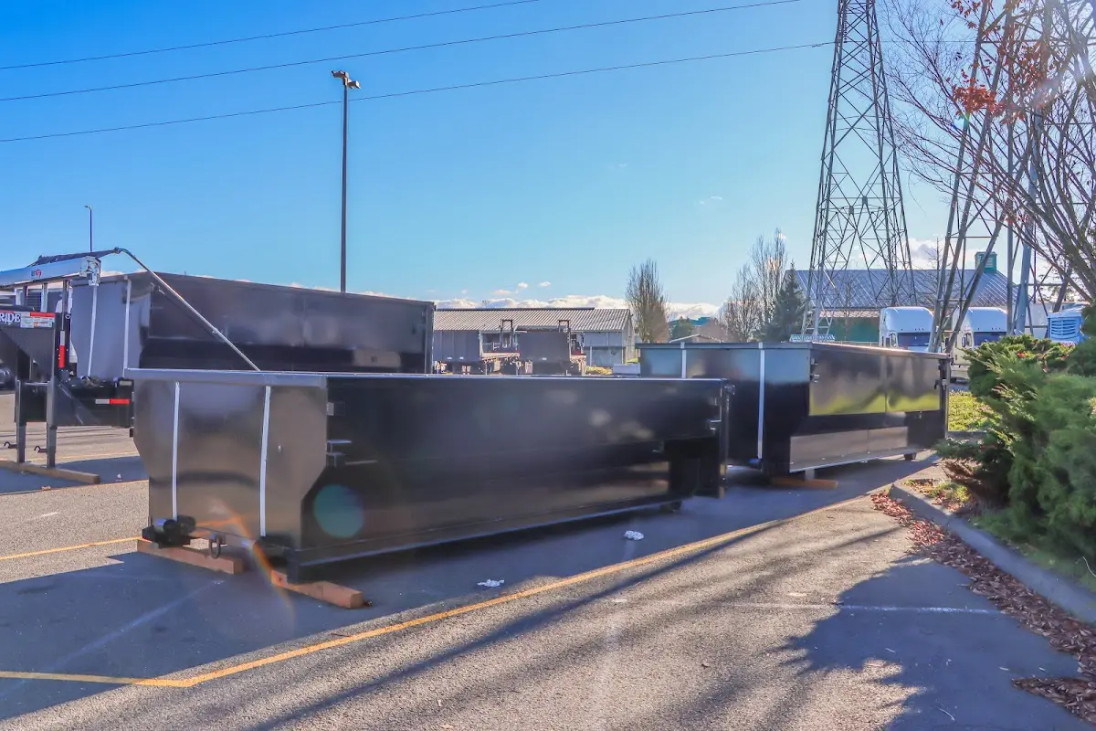 Roll-off dumpster ready for waste disposal at job site for 15 Yard Dumpster Rental in Gateway